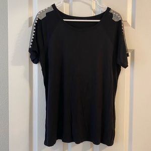 Flowy black top with pearl and mesh detail